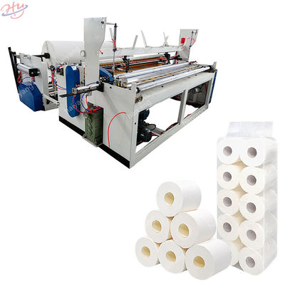 A máquina de perfuração automática de Rewinder gravou o rolo do lenço de papel do toalete que faz a máquina com impressão